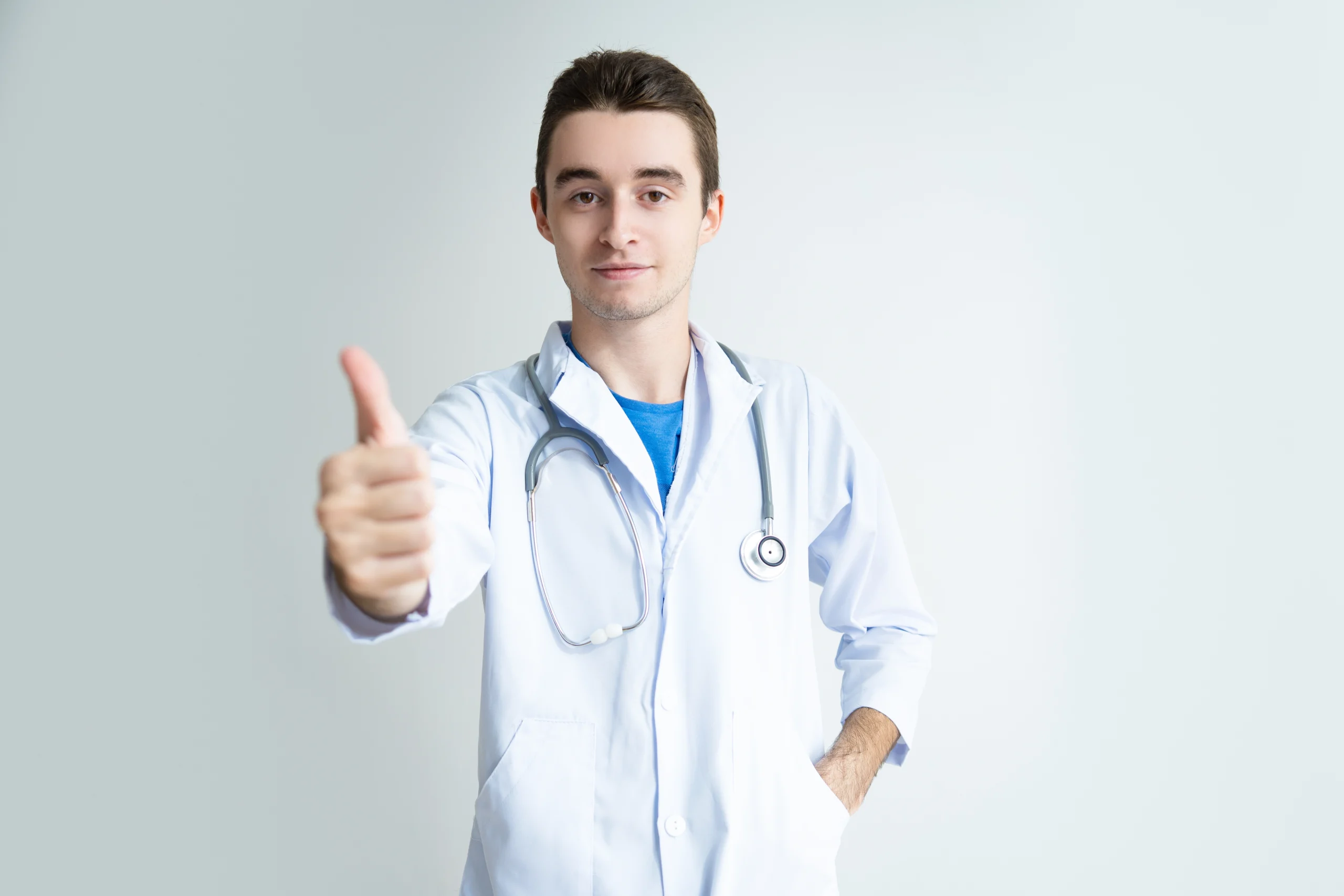 confident-male-doctor-showing-thumb-up Loved Locally, Trusted Completely